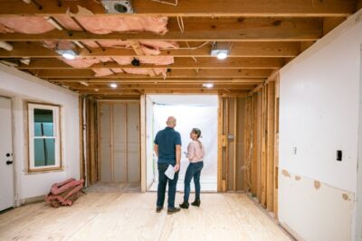 Couple supervising home renovation