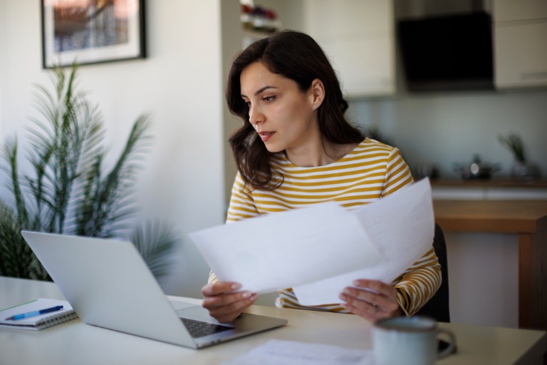 woman going throught her finances